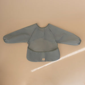 
                  
                    Babero Manga Larga (Roman Green)
                  
                