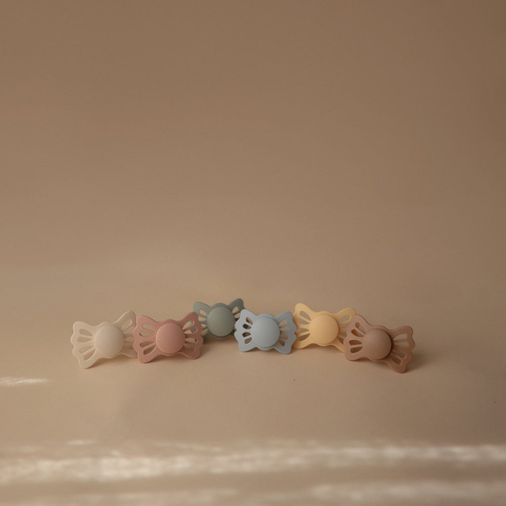 
                  
                    FRIGG Lucky Symmetrical Silicone Baby Pacifier | 2-Pack | 0-6 Months (Sage/Powder Blue)
                  
                