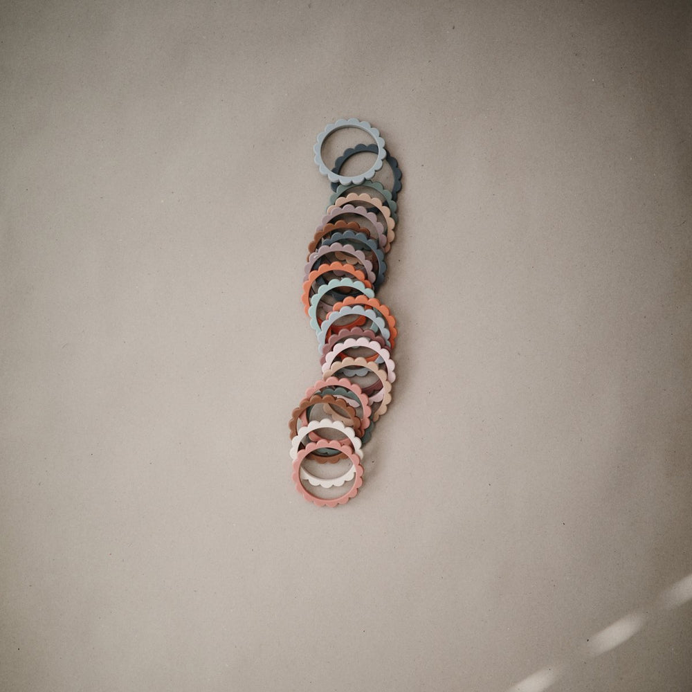 
                  
                    Pulsera de Flores de Dentición (Steel/Dove Gray/Stone)
                  
                