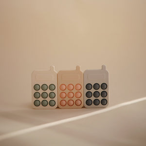 
                  
                    Phone Press Toy (Cambridge Blue)
                  
                